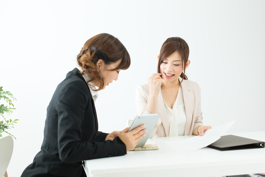 Beautiful young businesswomen working in the office