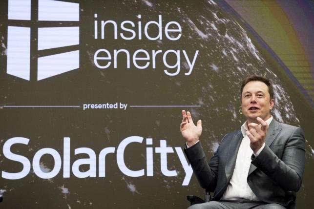 FILE PHOTO -- Elon Musk, chairman of SolarCity and CEO of Tesla Motors, speaks at SolarCity's Inside Energy Summit in Manhattan, New York October 2, 2015. REUTERS/Rashid Umar Abbasi