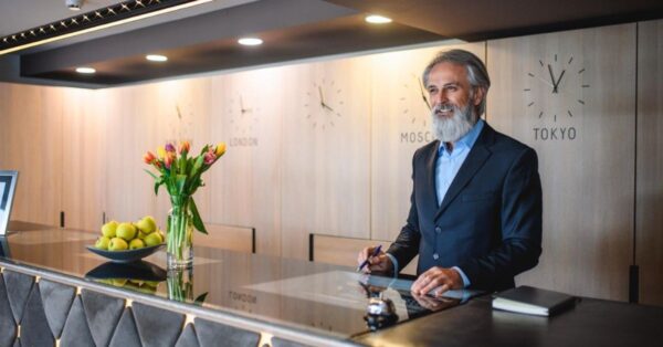 old senior man as hotel front desk